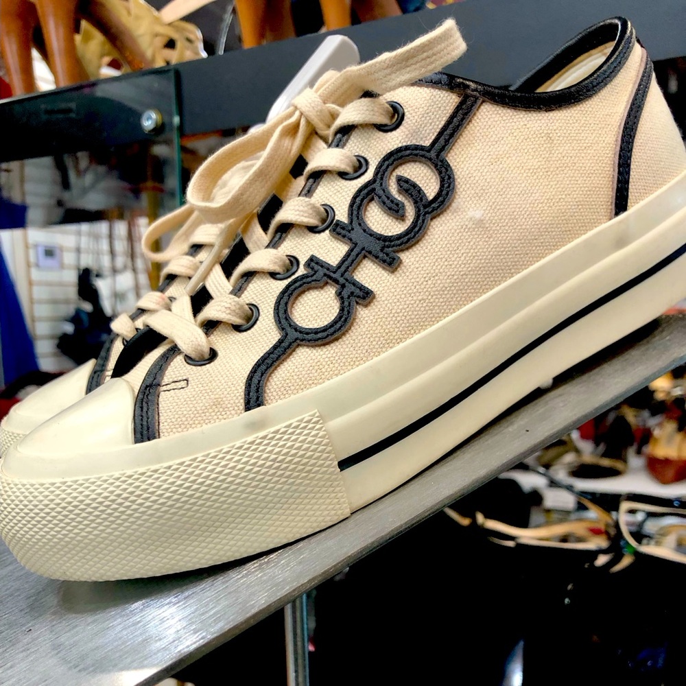 Jimmy Choo casual, but luxury shoe. Used once!! Box and linen bag included.